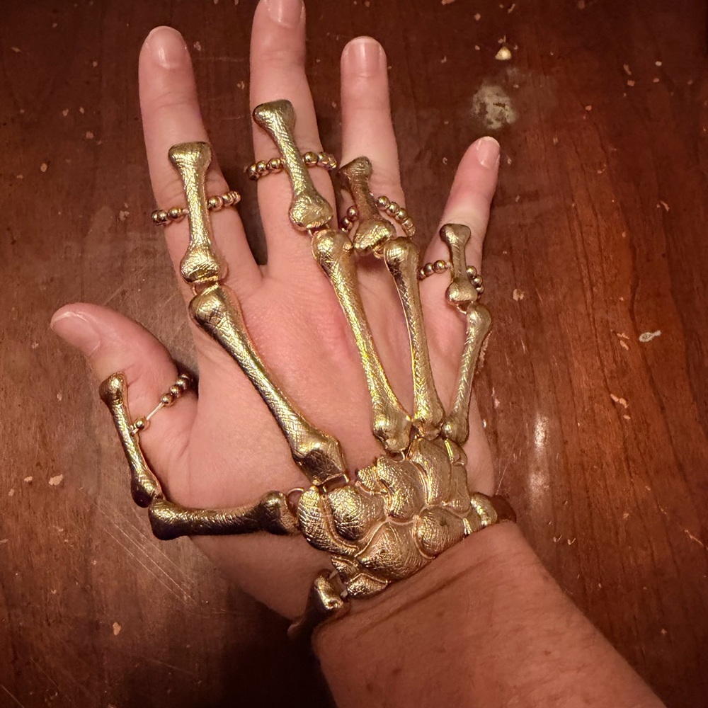 Gold skull / skeleton metallic hand jewelry